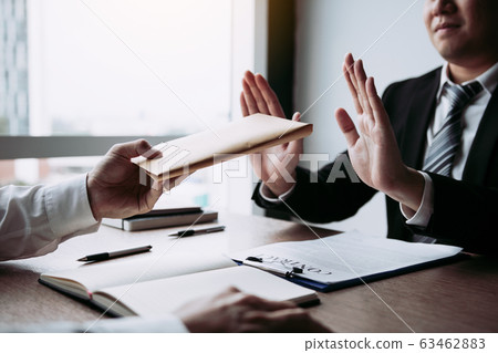 Businessmen are holding cash envelopes in order to Businessmen are holding cash envelopes in order to 63462883