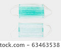 Typical three-ply surgical masks, medical masks, procedure mask, or simply as a face mask on white background. 63463538