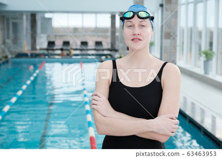 Confident female swimmer 63463953