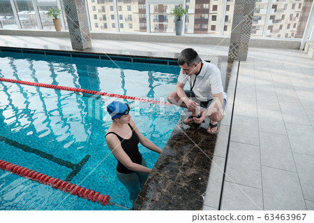Giving advice to swimmer how to improve time 63463967