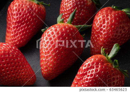 Strawberry image on black background 63465623