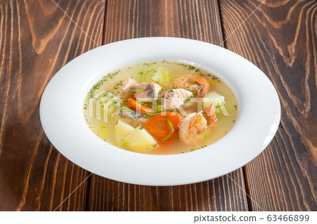 Plate of seafood soup with shrimps and salmon Plate of seafood soup with shrimps and salmon 63466899