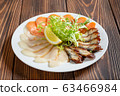 Mixed fish plate on wooden table. Cold starter. 63466984