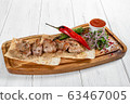 Grilled pork kebab with vegetables and red sauce  63467005