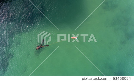Underwater hunter on the surface of the water while hunting on the Atlantic Sea. Portugal. 63468094