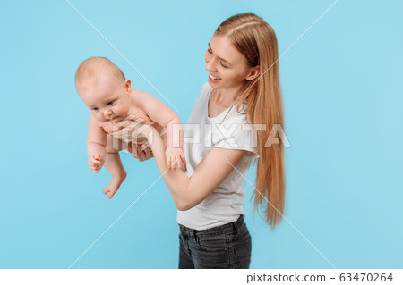 Happy family. young attractive mother with her Happy family. young attractive mother with her 63470264