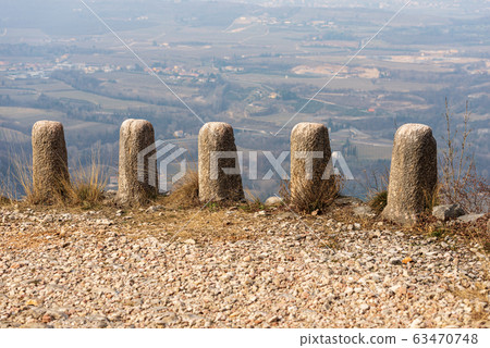 Ancient stone bollards used as guardrail - Veneto Italy Ancient stone bollards used as guardrail - Veneto Italy 63470748