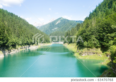 Val Noana artificial lake, Mezzano, Italy. 63470768
