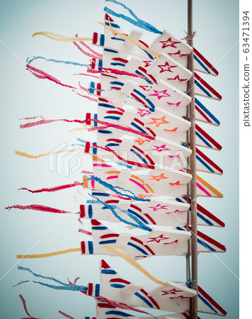 Colorful of handmade toy planes float in the wind. Colorful of handmade toy planes float in the wind. 63471394