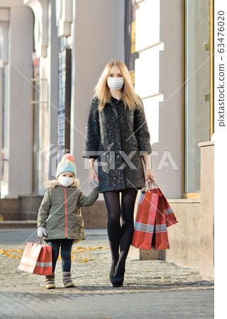 woman and little child in medical mask woman and little child in medical mask 63476020