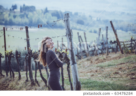 girl looking at the tuscanian landscape 63476284