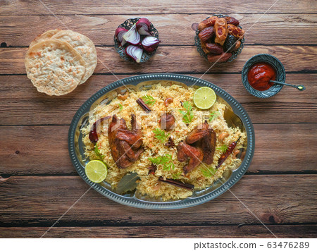 Homemade chicken Biryani. Arabic Kabsa with meat. 63476289