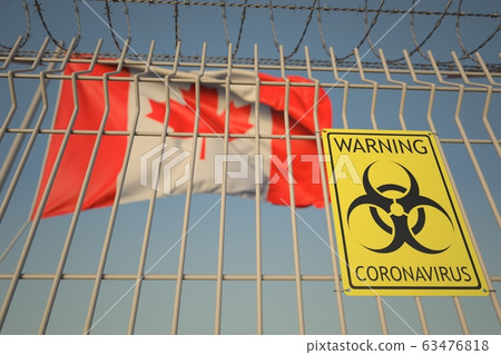 Coronavirus biohazard sign on the fence against the Canadian flag. Quarantine in Canada, conceptual 3D rendering Coronavirus biohazard sign on the fence against the Canadian flag. Quarantine in Canada, conceptual 3D rendering 63476818