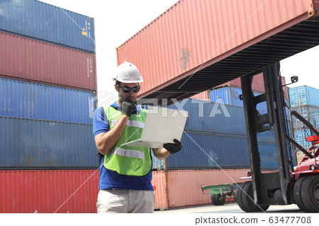 businessman or Foreman control loading Containers businessman or Foreman control loading Containers 63477708