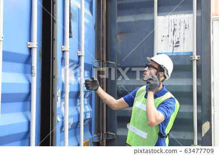 businessman or Foreman control loading Containers businessman or Foreman control loading Containers 63477709