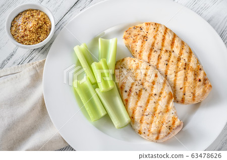 Portion of grilled chicken 63478626
