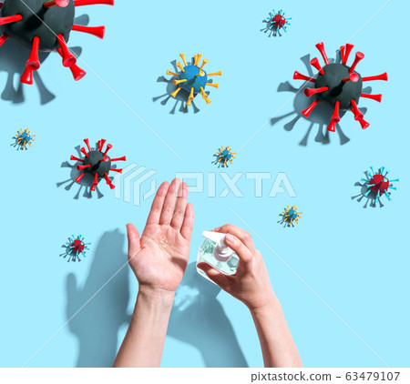 Applying sanitizer gel with epidemic influenza concept Applying sanitizer gel with epidemic influenza concept 63479107
