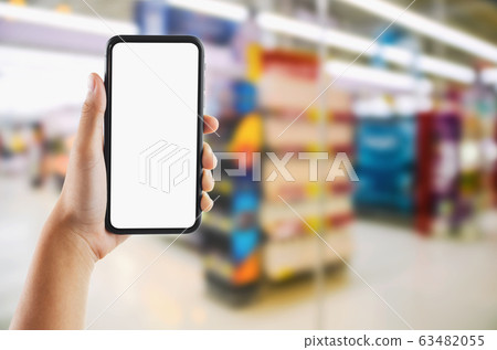 hand holding mobile white screen on Supermarket hand holding mobile white screen on Supermarket 63482055