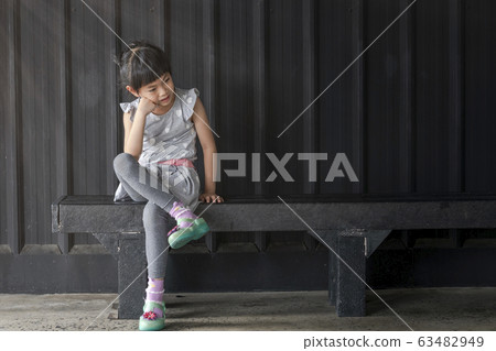 girl sit with one's legs 63482949