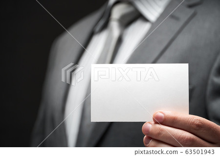 white blank business card closeup in businessman white blank business card closeup in businessman 63501943
