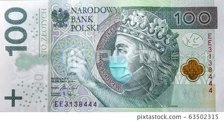 Coronavirus in Poland. Quarantine and global recession. 100 Polish zloty banknote with a face mask and antibacterial spray against infection. Global economy hit by corona virus covid19 outbreak Coronavirus in Poland. Quarantine and global recession. 100 Polish zloty banknote with a face mask and antibacterial spray against infection. Global economy hit by corona virus covid19 outbreak 63502315