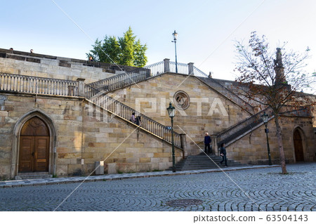 New-gothic stairs from Charles Bridge to Kampa, Mala Strana, Prague, Czech Republic, sunny day 63504143