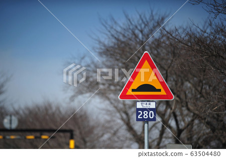 Speed bump road traffic sign Speed bump road traffic sign 63504480