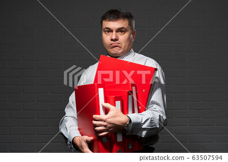 Very busy businessman closeup portrait, posing 63507594
