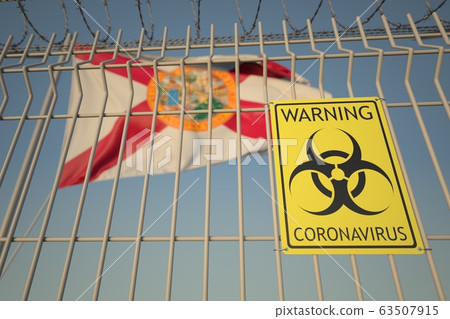 Coronavirus warning sign on the barbed wire fence against flag of Florida. COVID-19 quarantine related 3D rendering Coronavirus warning sign on the barbed wire fence against flag of Florida. COVID-19 quarantine related 3D rendering 63507915