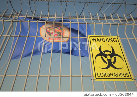 Biohazard coronavirus sign on the barbed wire fence near flag of Minnesota. COVID-19 quarantine related 3D rendering 63508044