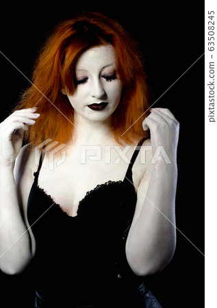 Beautiful Young woman as sexy vampire halloween 63508245