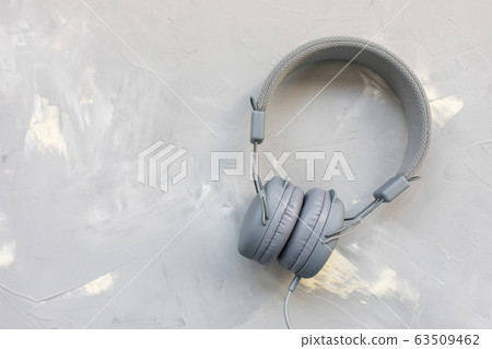 Headphones on gray background Headphones on gray background 63509462