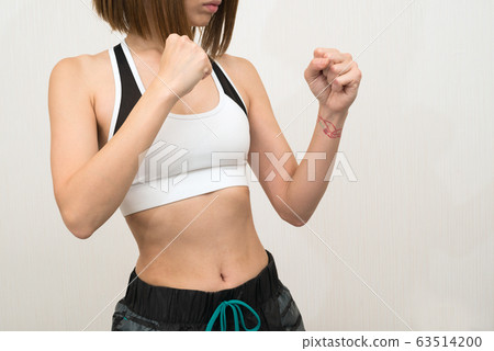 Abdomen, woman, fighting 63514200