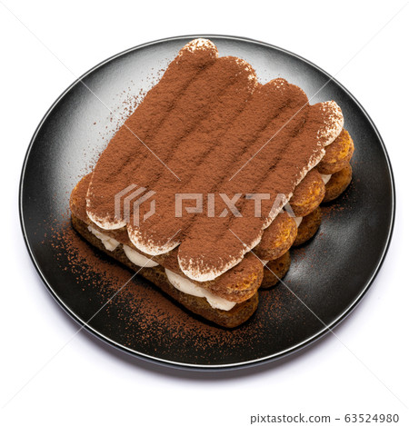 Classic tiramisu dessert on ceramic plate isolated on white background with clipping path 63524980