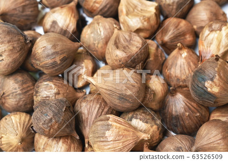 black garlic healthy food arranging on white background 63526509