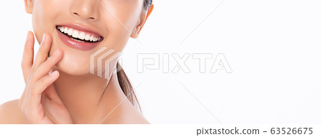 Beautiful smile young woman. White teeth on white 63526675