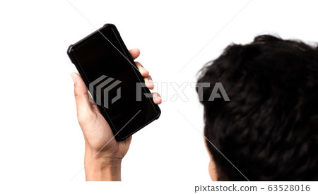 Asian person holding a mobile smartphone. 63528016