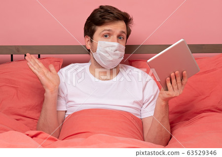man in bed wearing mask and recovery from the man in bed wearing mask and recovery from the 63529346