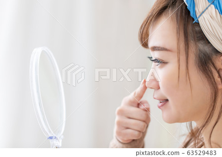 Woman in room wear Woman in room wear 63529483