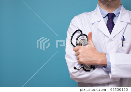 Medical intern or doctor with stethoscope and 63530130