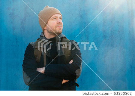 Handsome caucasian young man in hat and jacket Handsome caucasian young man in hat and jacket 63530562