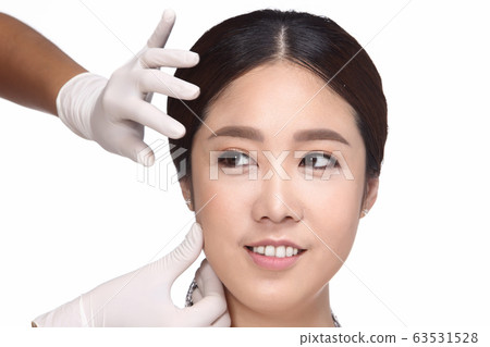 Doctor injects Filler Botox to Asian Woman Beauty 63531528