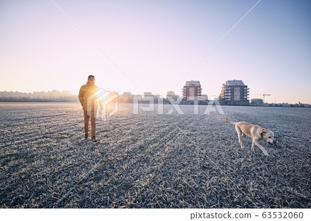 Frosty morning with dog 63532060