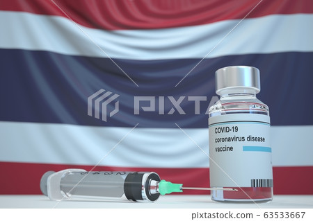 COVID-19 coronavirus disease vaccine vial and syringe against the Thai flag. Medical research and vaccination in Thailand, 3D rendering 63533667