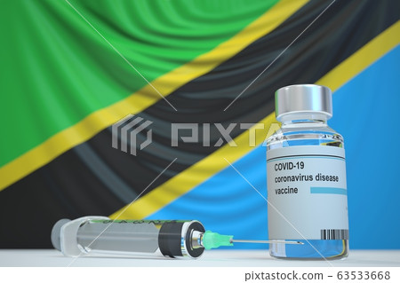 COVID-19 coronavirus disease vaccine vial and syringe against the Tanzanian flag. Medical research and vaccination in Tanzania, 3D rendering 63533668