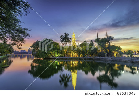Tran Quoc pagoda in the afternoon in Hanoi, Vietnam. This pagoda locates on a small island near the southeastern shore of West Lake. This is the oldest Buddhist temple and tourist destination in Hanoi 63537043