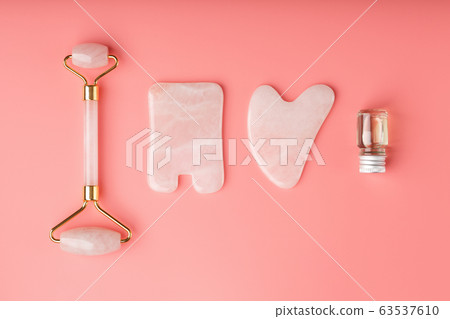 Gua sha massage tool made of natural pink Gua sha massage tool made of natural pink 63537610