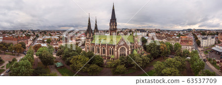 180 degrees panoramic landscape of Lviv city with old Neo-Gothic style church of Sts. Olha and Elizabeth. Aerial drone view of old tourist European city 63537709