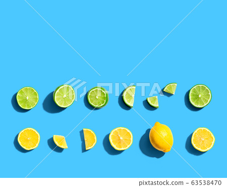 Fresh lemons and limes overhead view Fresh lemons and limes overhead view 63538470
