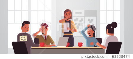 business people group luaghing sticky note with text kick me on back of businessman april fools day concept modern office interior horizontal portrait 63538474